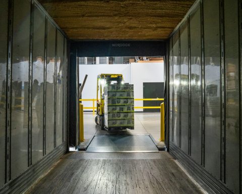 yellow and black forklift during daytime