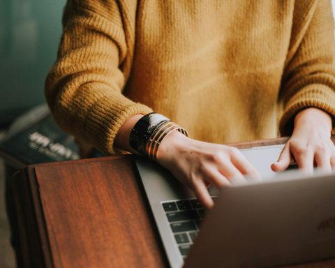 person using laptop computer