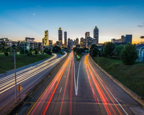 timelapse photo of highway during golden hour