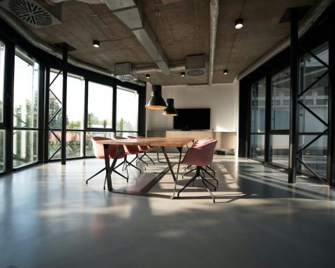 photo of dining table and chairs inside room