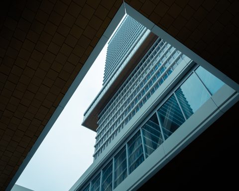 a view of a tall building through a window