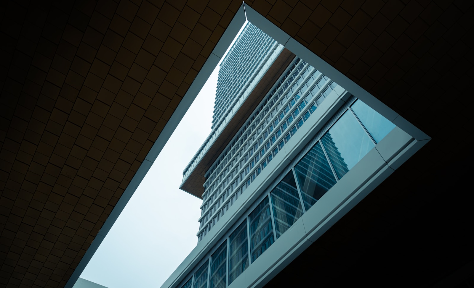 a view of a tall building through a window