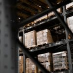 a warehouse filled with lots of boxes and pallets