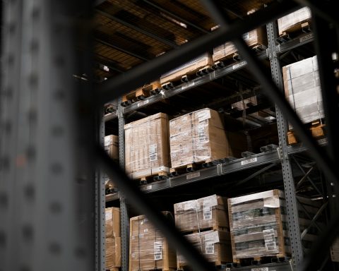 a warehouse filled with lots of boxes and pallets