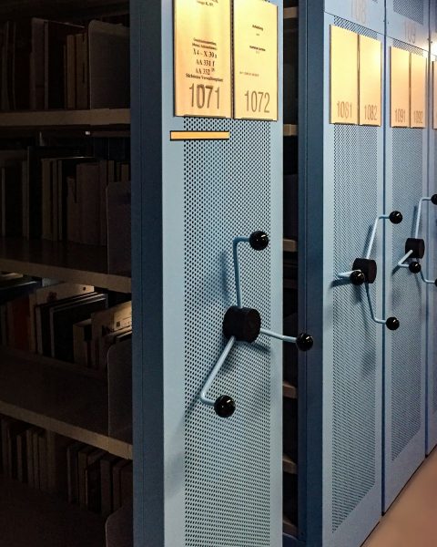 books in shelves in room