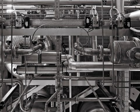 stainless steel and red industrial machine