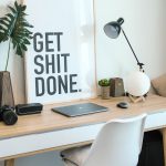 brown and white wooden desk with chair and laptop
