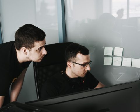 man in black tank top wearing eyeglasses
