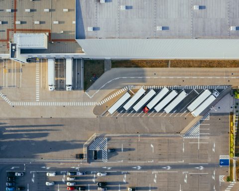 aerial view of vehicles in parking area