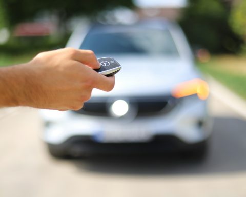 a hand holding a phone