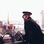 man wearing black coat