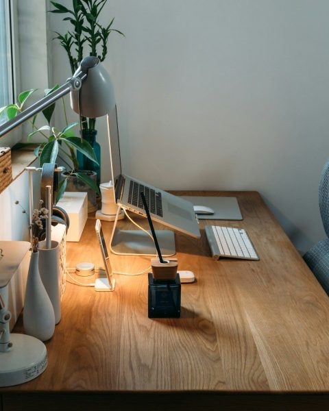 grey desk lamp on top of office desk