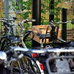 a bunch of bikes parked next to each other