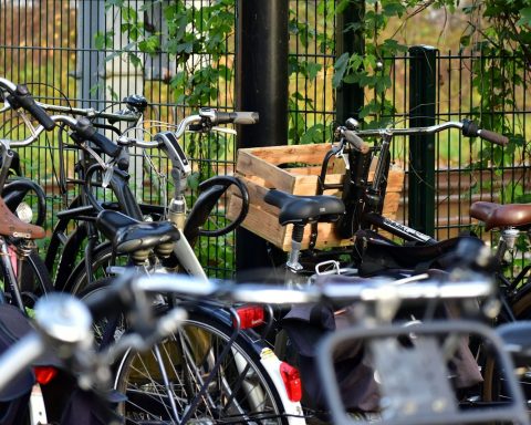 a bunch of bikes parked next to each other
